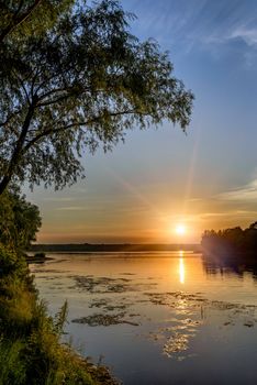 Sunset over the Dnieper river in Kiev, Ukraine, during a warm summer evening.