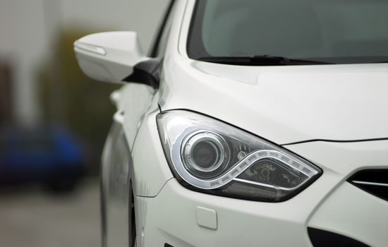 Headlight of the modern car photographed close-up