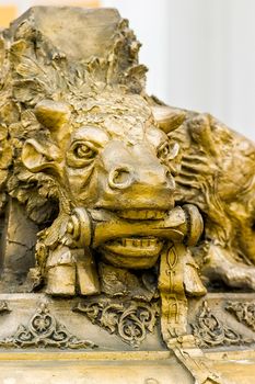 A detail of the golden Kiev Pechersk Lavra bell in Kiev. The Bull