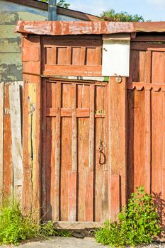 Old wooden ukrainian door in the Kiev suburb