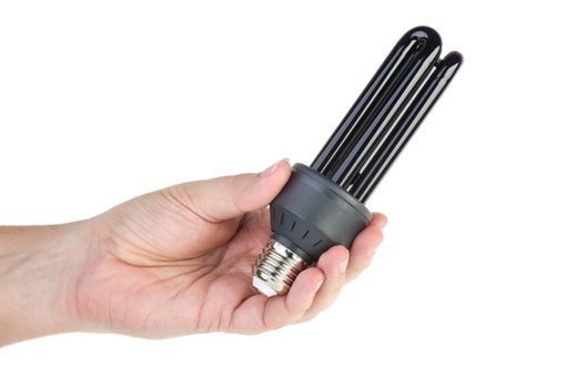 Black (UV) fluorescent lamp with e27 base in hand on the white background