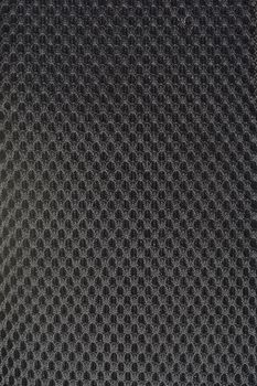 black gray fishnet cloth material as a texture background