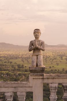 a statue at a temple on the Mount Phnom Sompov near the city of Battambang in Cambodia.  Cambodia, Battambang, November, 2018