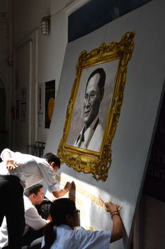 Bangkok, Thailand- OCT 22, 2016: Students  painting  the portrait of King Bhumibol Adulyadej at Silpakorn University on OCT 22, 2016 Bangkok Thailand.