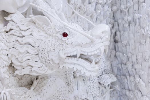 Beautiful White dragon statue at Huay Pla Kang Temple, Chiang Rai, Thailand.