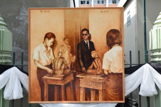 BANGKOK, THAILAND - November 16,2016 : Thai art students painting of His Majesty King Bhumibol portrait to participate in the exhibition to honor The Lifetime Journey of the World's Development King