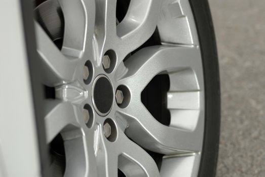 tire and alloy wheel on this high performance sports car - fragment