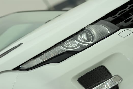 Headlight of the modern car photographed close-up