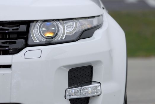 Headlight of the modern car photographed close-up