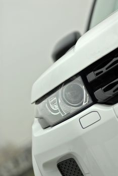 Headlight of the modern car photographed close-up