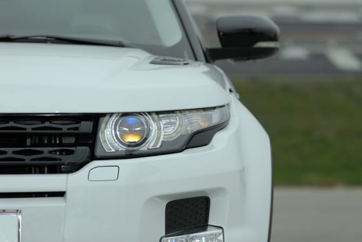 Headlight of the modern car photographed close-up