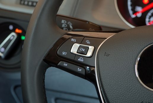 cruise control stick which is located on the wheel