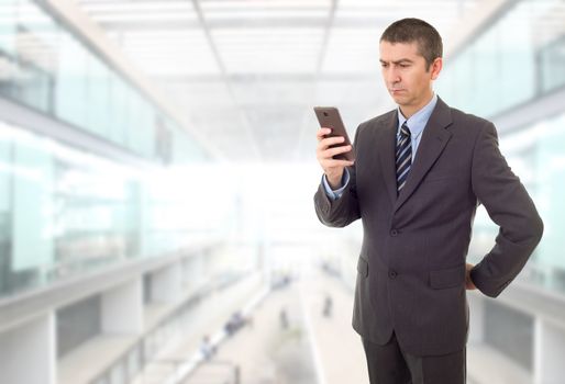 worried business man on the phone, at the office