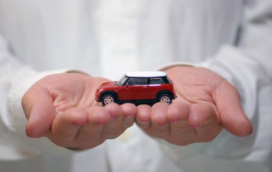 the car is in woman's hands, car protection