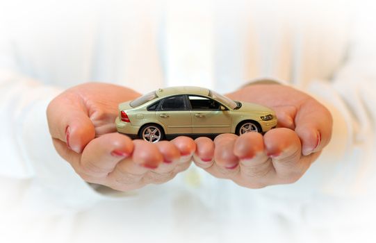 the car is in woman's hands, car protection