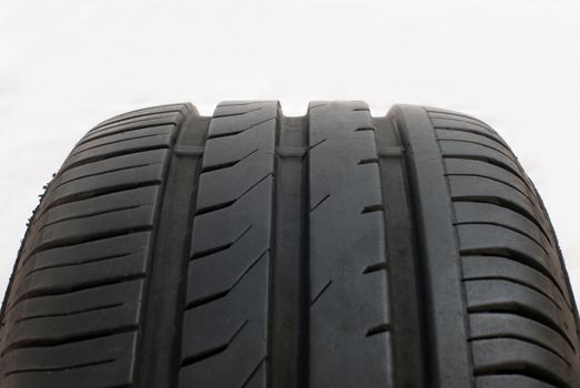 Brand new modern summer car tire, fragment