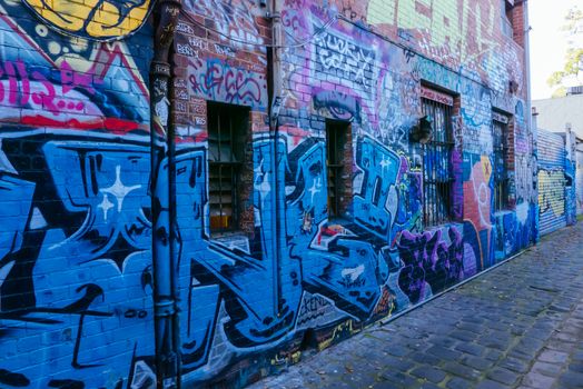 Melbourne, Australia - June 12, 2020: Street art and graffiti, famous in Melbourne, is seen in Fitzroy area near Brunswick St