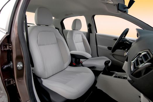Front seats of a modern car, light leather