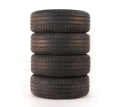 4 summer tires isolated on white background