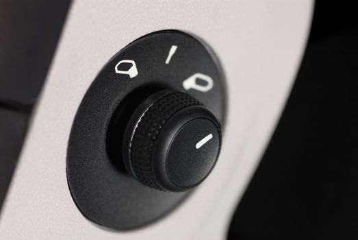 side mirror switch control, car interior detail