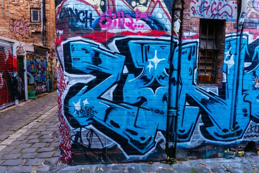 Melbourne, Australia - June 12, 2020: Street art and graffiti, famous in Melbourne, is seen in Fitzroy area near Brunswick St