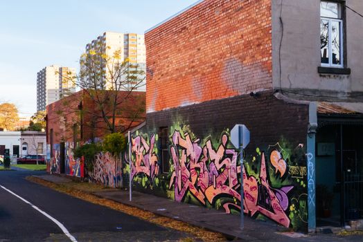 Melbourne, Australia - June 12, 2020: Street art and graffiti, famous in Melbourne, is seen in Fitzroy area near Brunswick St