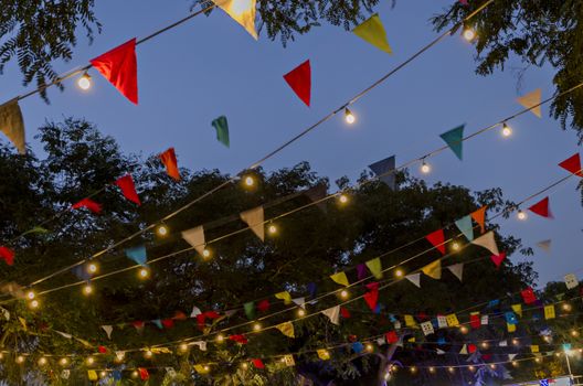 Colored pennants with spot lights around them