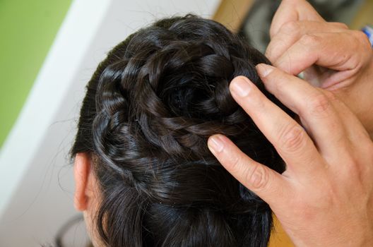 Woman in a hairdresser doing a hairstyle