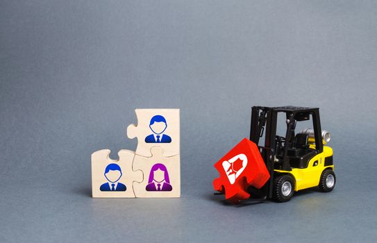 A forklift truck carries a red puzzle to the unfinished assembly of business team. Search, recruitment staff, hiring leader. Creating an efficient and productive business unit. Leadership and teamwork