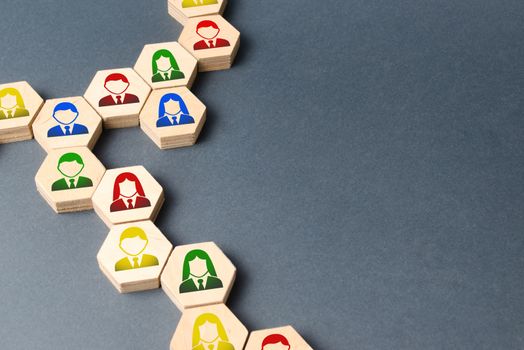 Symbols of employees on the chains of hexagons. The concept of business connections. Team building, business organization and staff hierarchy. Human resources management, recruitment. Single whole.