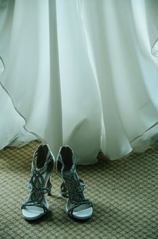 Shoes and dress of a bride