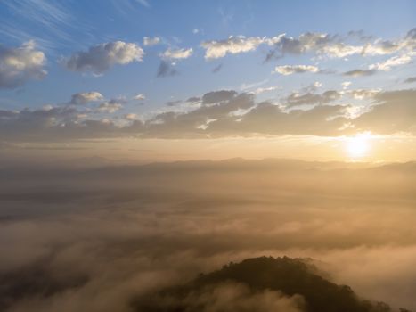 Aerial view forest in morning fog mist, breathing mountains, Sunshine on The Morning Mist.