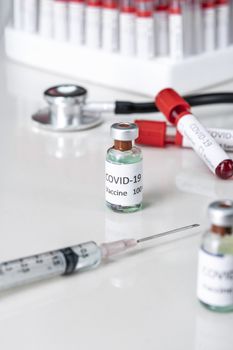 Nobel coronavirus covid-19 vaccine vial a illustrative picture, doctor in the laboratory with a biological tube for analysis and sampling of Covid-19 infectious disea.