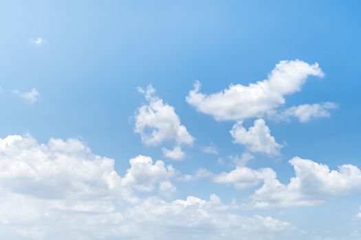 Blue sky background with clouds, The cumulus level cloud level is 8,000-20,000 feet beautiful by nature, white fluffy clouds In sunny summer.