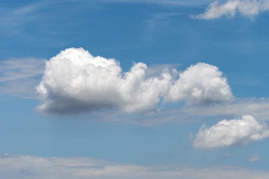 One cloud on the blue sky, white cloud in the blue sky single.