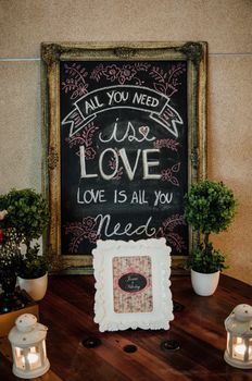 Vintage wedding decoration with love pictures