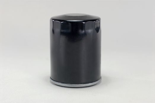 Oil filter enclosed in a metal housing