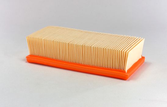 Car air filter isolated on white background