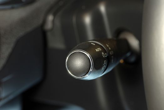 Closeup image of car lighting control switch