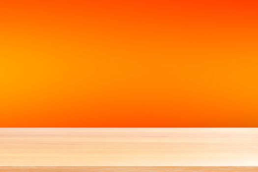 empty wood table floors on gradient orange soft background, wood table board empty front colorful gradient, wooden plank blank on light orange gradient for display products or banner advertising