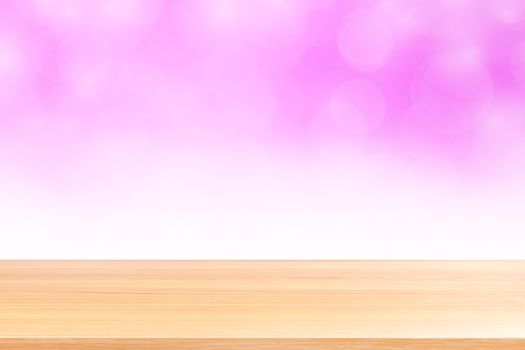 empty wood table floors on blurred bokeh soft pink white gradient background, wooden plank empty on pink bokeh colorful light shade, colorful bokeh lights gradient soft for banner advertising products