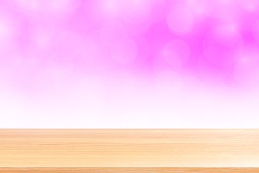 empty wood table floors on blurred bokeh soft pink white gradient background, wooden plank empty on pink bokeh colorful light shade, colorful bokeh lights gradient soft for banner advertising products