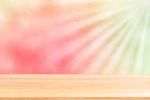 empty wood table floor on soft pink bokeh lights beam shine gradient background, wooden plank empty on green pink bokeh colorful light shine, colorful bokeh lights gradient soft for banner advertising