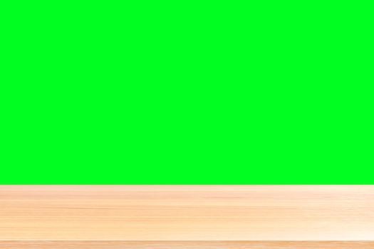 wood floors and green screen background, wood table board empty in front isolated green screen, wooden plank blank on green screen with perspective brown wood table for mock up display products