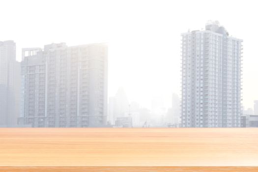 wood plank on blurred city background, empty wood table floors on building and city landscape soft background, wood table board empty front urban landscape background soft