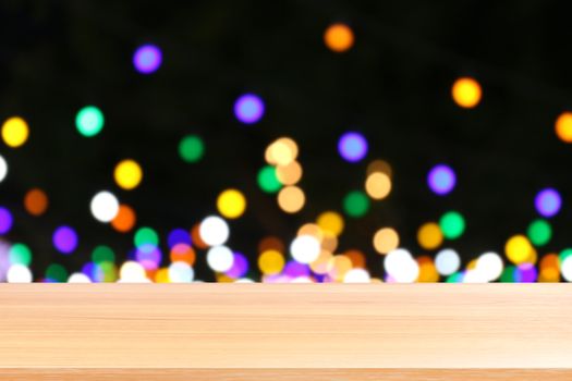 wood plank on colorful bokeh light abstract background, empty wood table floors on abstract bokeh night light multi color background, wood table board empty front colorful bokeh multi color beam light
