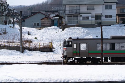 Japanese Train Station Covered in Snow.