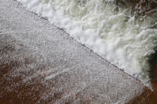 Dam water flow, Surface flow, Flowing water at Small water reservoir, Rural water retention dam, splash, Sponge spray