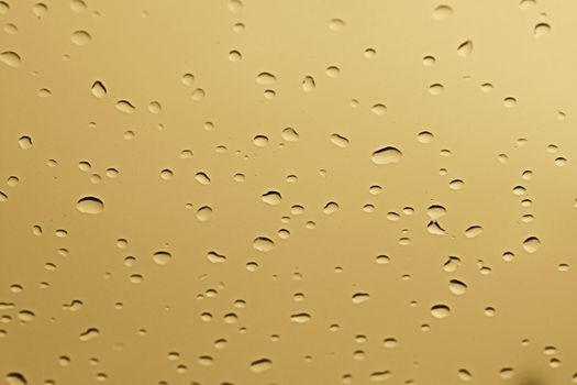 water rain drop on soft blue nature glass for abstract fresh background