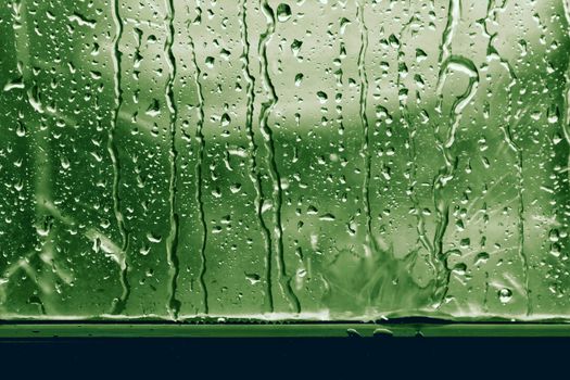 rain, raindrop on window glass fresh for background
